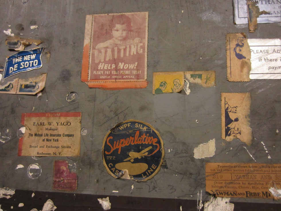 Vintage stickers and stamps adorn the walls. [PHOTO: Ryan Green]