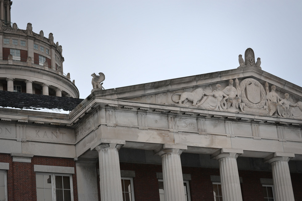 The frieze along the library's roof line contains inscriptions of names of famous thinkers like Plato, Rene Descartes, and Immanuel Kant. [PHOTO: RochesterSubway.com]