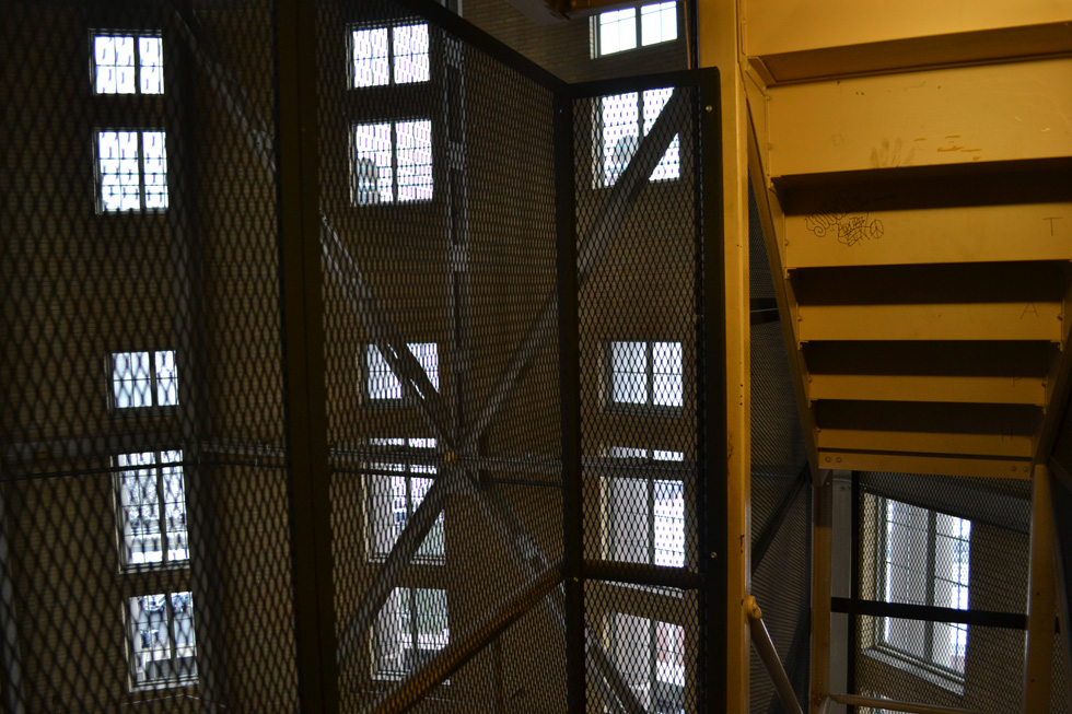 After a 10-or-so-story elevator ride we're dropped into a steel cage enclosed stair case located inside the giant rotunda. [PHOTO: RochesterSubway.com]