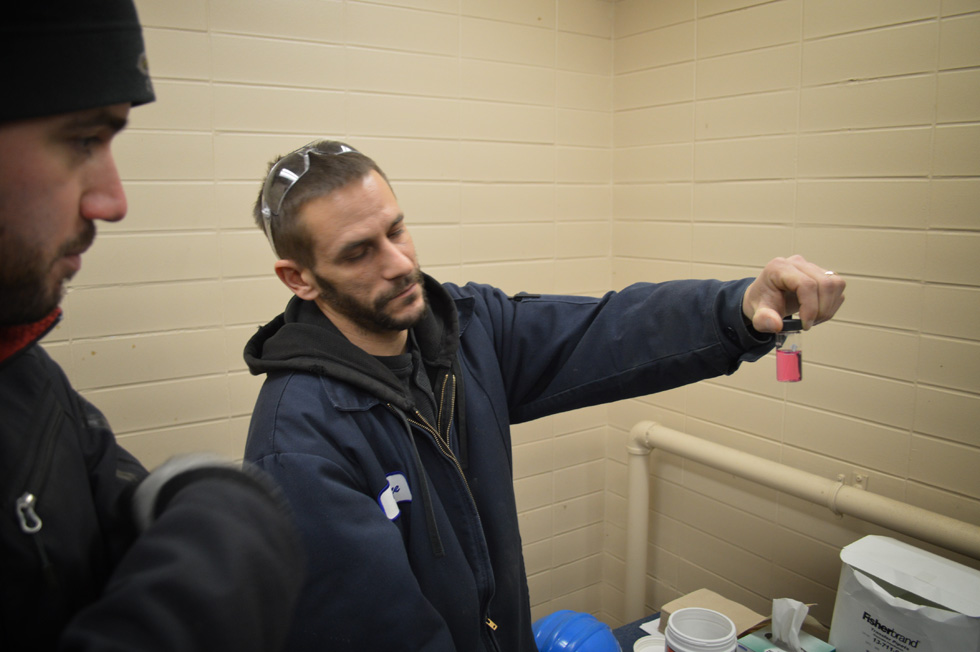 Here, facility operators run Chlorine residual tests 24/7 to verify that the disinfecting dose of Sodium hypochlorite is just right. Pink = Good. [PHOTO: RochesterSubway.com]