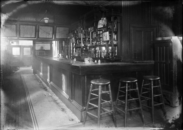 The bar room inside Wulff's Hotel, at the corner of State and Factory Streets in Rochester; the scene of a notorious murder on December 18, 1920. [IMAGE: From the Albert R. Stone Negative Collection, Rochester Museum & Science Center, Rochester, NY.]